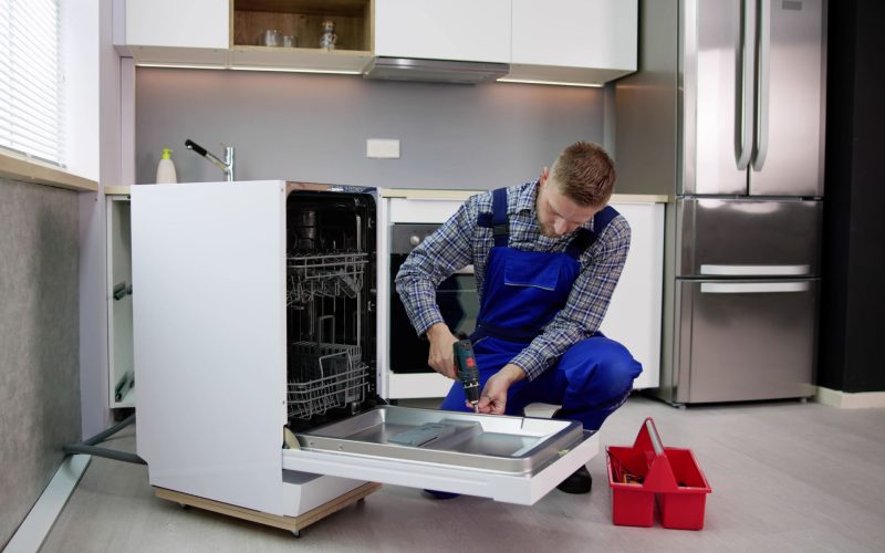 Dishwasher repair service in Fontana California by professional appliance technician fixing home appliance